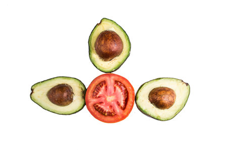 avocatto and tomato on a white backgroundの写真素材