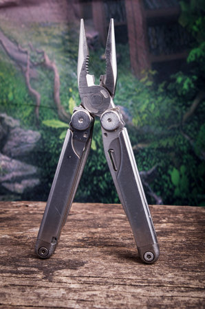 leatherman tool knife in the wood