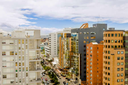 daytime city street with tall buildings and blue sky Quito, Ecuadorの写真素材