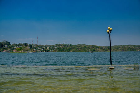 flooded esplanade isla de flores island guatemala central americaの写真素材