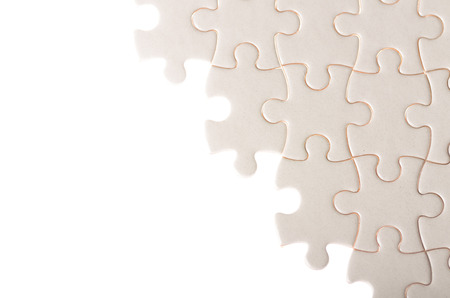 white incomplete jigsaw puzzle closeup concept of failure completing task under constructionの写真素材