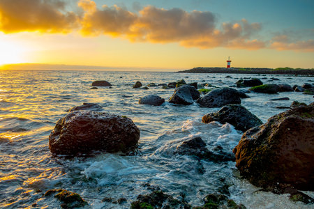 lighthouse at sunset in san cristobal galapagos islands ecuadorの写真素材