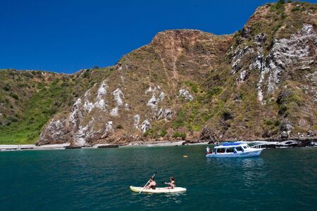 MANABI, ECUADOR - JUNE 4, 2012: Unidentified tourists enjoying a daytrip kayaking in beautiful paradise beach in Salango island.のeditorial素材