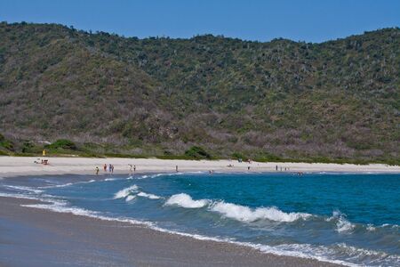 MANABI, ECUADOR - JUNE 3, 2012: Unidentified tourists enjoying a daytrip in beautiful paradise beach in Salango island.のeditorial素材