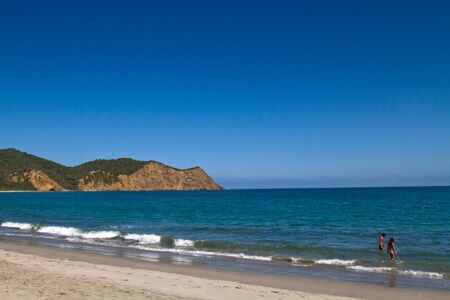 MANABI, ECUADOR - JUNE 2, 2012: Unidentified tourists enjoying the beach in Machalilla National Park preserve in Manabi.のeditorial素材