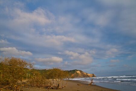 MANABI, ECUADOR - JUNE 5, 2012: Unidentified tourists enjoying a day in the peaceful beach of Ayampe.のeditorial素材