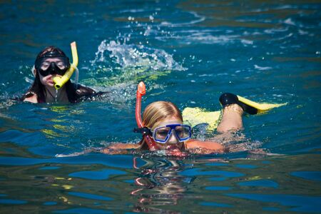 MANABI, ECUADOR - JUNE 3, 2012: Unidentified tourists enjoying a daytrip snorkeling in beautiful paradise beach in Salango island.のeditorial素材