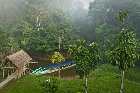 ORELLANA, ECUADOR - AUGUST 10, 2012: Unidentified tourists relaxing in hammocks in an ecological lodge in amazon rainforest, Yasuni National Park, Orellana, Ecuadorのeditorial素材