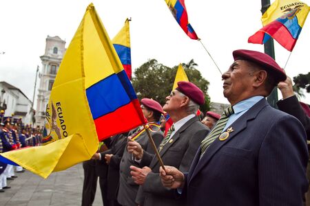 QUITO, ECUADOR - MARCH 3, 2014: Unknown spectator s with flags during Changing of the Guard, Presidential Palace in Quito, Ecuadorのeditorial素材