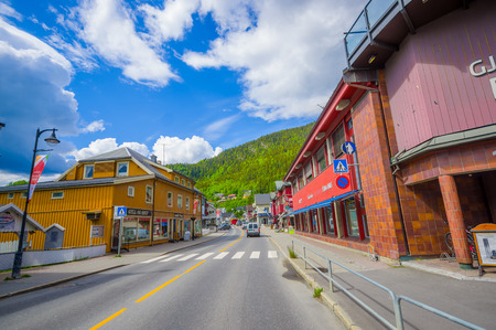 VALDRES, NORWAY - 6 JULY, 2015: Charming small town of Fagernes with small city buildings sorrounded by green mountains.のeditorial素材