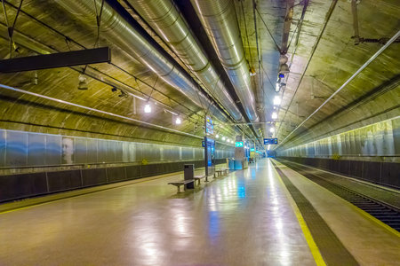 OSLO, NORWAY - 8 JULY, 2015: Nationaltheatret train station downtown Oslo showing large underground hall and platform.のeditorial素材