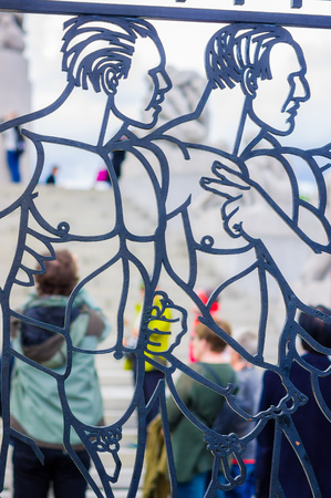 OSLO, NORWAY - 8 JULY, 2015: Tourists enjoying a beautiful sunny day in the famous Vigelandsparken which contains numerous nude sculptures.のeditorial素材