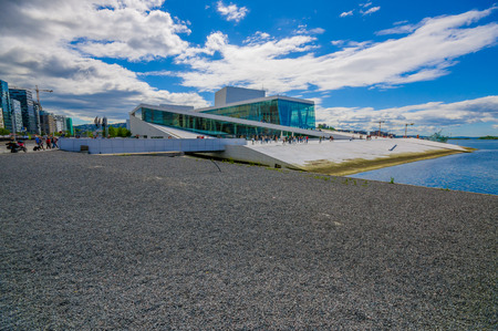 OSLO, NORWAY - 8 JULY, 2015: Walking on the spectacular opera house building located waterfront eastside of city with beautiful architecture and views.のeditorial素材