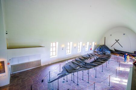 OSLO, NORWAY - 8 JULY, 2015: Ancient remains of old ship used by the vikings at official museum on Bygdoy.のeditorial素材