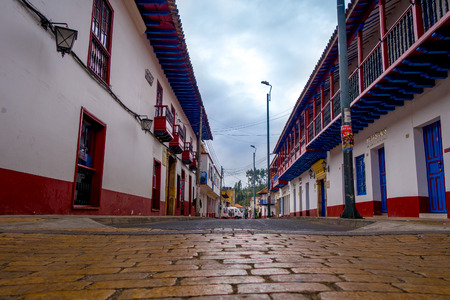 ZIPAQUIRA, COLOMBIA - FEBRUARY 3, 2015: Street angle from quiet city center with beautiful historic town houses at Zipaquira, located in the middle of Colombia.のeditorial素材