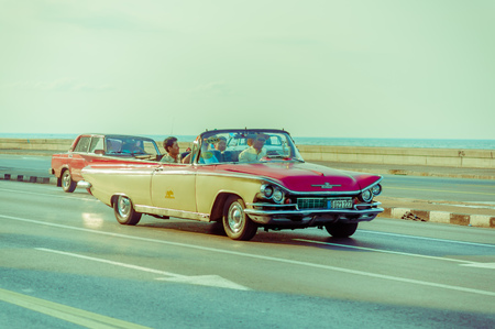 HAVANA, CUBA - AUGUST 30, 2015: Old classic American cars used for taxi and tourist transportation. Before a new law issued on October 2011, cubans could only trade cars that were on the road before 1959.のeditorial素材