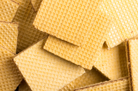 Closeup of piled up crispy tasty square cookies.の写真素材