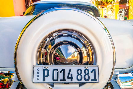 TRINIDAD, CUBA - SEPTEMBER 8, 2015: Classic Old American cars used for transportation and tourism services due to embargo.のeditorial素材