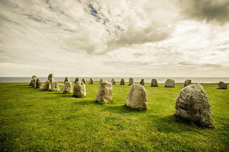 Beautiful view of Ales stones, impressing archaeological megalithic monument in Skane, Sweden. Color tonedの写真素材