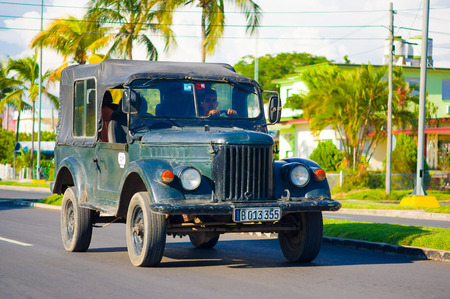 CIENFUEGOS, CUBA - SEPTEMBER 12, 2015: An Old American Car in the center of ths City.のeditorial素材