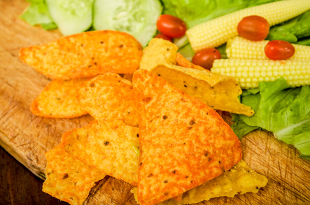 nachos and guacamole dip, avocado close upの写真素材