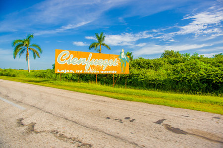 CENTRAL ROAD, CUBA - SEPTEMBER 06, 2015: Communist propaganda billboard in the rural highway systemのeditorial素材