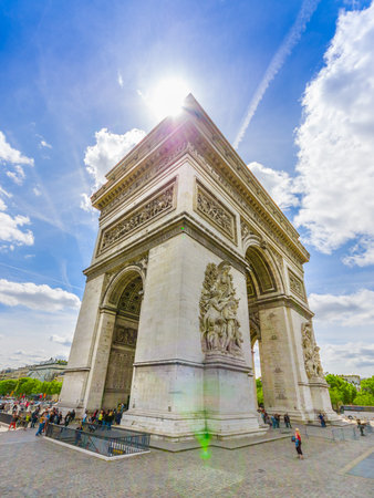 PARIS, FRANCE - JUNE 1, 2015: Beautiful summer view of Champs Elysees and Arc de Triomphe with visiting touristsのeditorial素材
