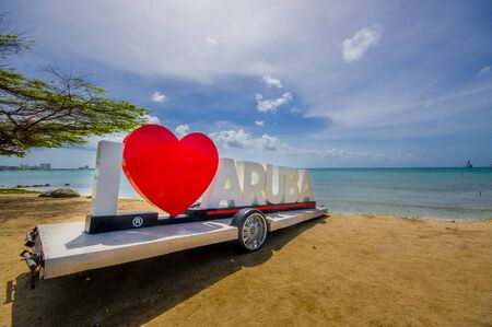 ORANJESTAD, ARUBA - NOVEMBER 05, 2015: I loveAruba  sign used for tourism near the beachのeditorial素材