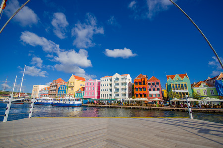 WILLEMSTAD, CURACAO - NOVEMBER 1, 2015:  Queen Emma Bridge in front of the Punda district, is a pontoon bridge across St. Anna Bayのeditorial素材