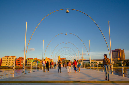 WILLEMSTAD, CURACAO - NOVEMBER 1, 2015:  Queen Emma Bridge in front of the Punda district, is a pontoon bridge across St. Anna Bayのeditorial素材