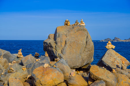 Stack of stones on sea shore, Aruba