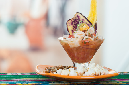Delicious fish ceviche, typical ecuadorian plate served with popcorn and plantain chips. Close up shotの写真素材