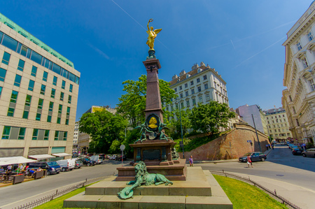 Vienna, Austria - 11 August, 2015: Liebenberg monument, spectacular tall statue with golden person on top.のeditorial素材