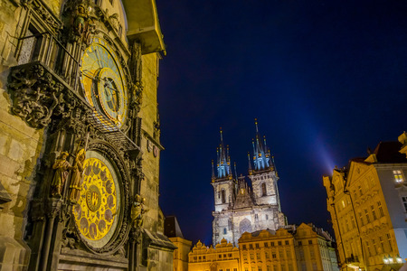 Prague, Czech Republic - 13 August, 2015: Closeup famous astronomical clock tower located in city centre, towers Church Of Our Lady vizible background, very nice evening light.のeditorial素材