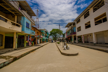 Muisne, Ecuador - March 16, 2016: Buildings in the center of the city, main street, in the coast of Ecuador.のeditorial素材