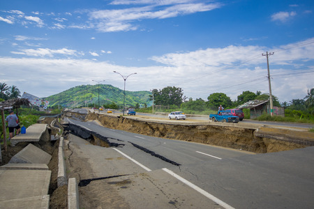Portoviejo, Ecuador - April, 18, 2016: Cracked road after 7.8 earthquake.のeditorial素材