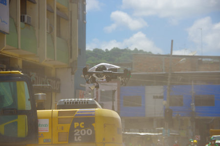 Portoviejo, Ecuador - April, 18, 2016: Heavy machinery picking rubble from destroyed buildings after...