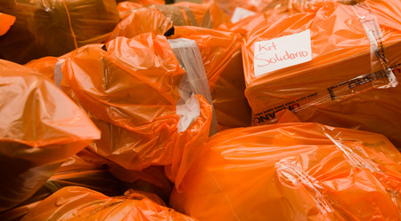 Quito, Ecuador - April 23, 2016: Disaster relief food, clothes, medicine and water for earthquake survivors in the coast. Gathered at Bicentenario Park.のeditorial素材
