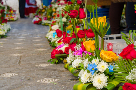 Cuenca, Ecuador - April 22, 2015: Beauitful colourful flower bouquet arrangements for sale along sidewalk.のeditorial素材