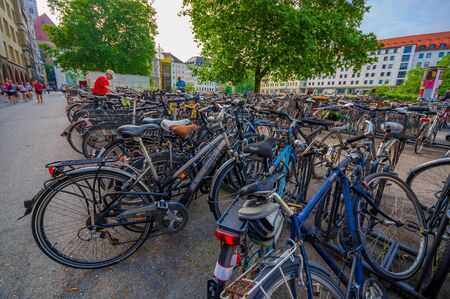 Munich, Germany - July 30, 2015: Pubic bicycle parking station with countless bikes standing lined up.のeditorial素材