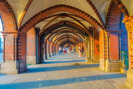 BERLIN, GERMANY - JUNE 06, 2015: Oberbaumbrucke in Berlin, beautiful space for pedestrians, sun...