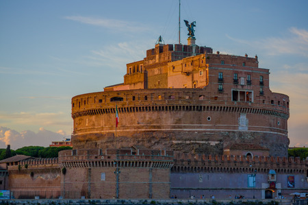 ROME, ITALY - JUNE 13, 2015: Saint Angelo castle in the center of Rome, an angel in the top and Italian flag on the side.のeditorial素材