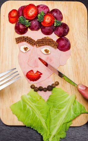 Face portrait made from various sliced grocery products, artistic food concept.の写真素材