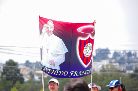 QUITO, ECUADOR - JULY 7, 2015: Funny poster of pope Francisco and San Lorenzo flag of soccer club. Pope is a huge fan of this club.のeditorial素材