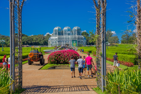 CURITIBA ,BRAZIL - MAY 12, 2016: entrance to the botanical garden of curitiba and the glass palace as background.のeditorial素材