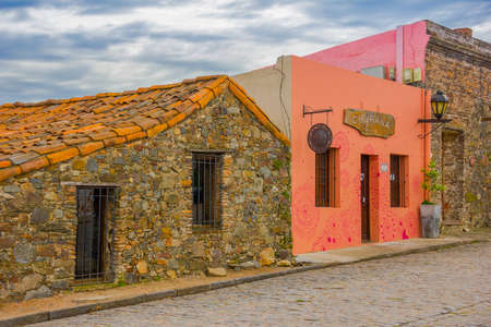 COLONIA DEL SACRAMENTO, URUGUAY - MAY 04, 2016: facade of some old houses with a colonial style.のeditorial素材