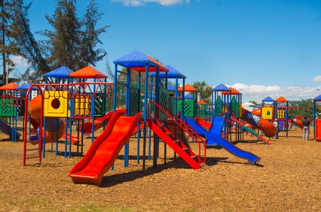 QUITO, ECUADOR - 8 AUGUST, 2016: Colorful public playground towers with tunnels and slides, located in inner city park La Carolina, beautiful sunny day.のeditorial素材