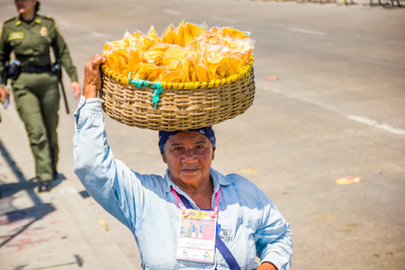 BARRANQUILLA, COLOMBIA - FEBRUARY 15, 2015: Street vendors in Colombia's most important folklore celebration, the Carnival of Barranquilla, Colombiaのeditorial素材