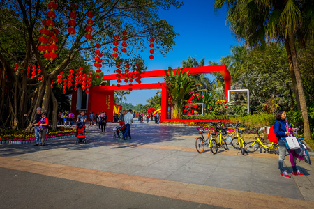 SHENZEN, CHINA - 29 JANUARY, 2017: Inner city streets with sorroundings, beautiful mix of traditional chinese and modern architecture, people shopping walking around, great blue skyのeditorial素材