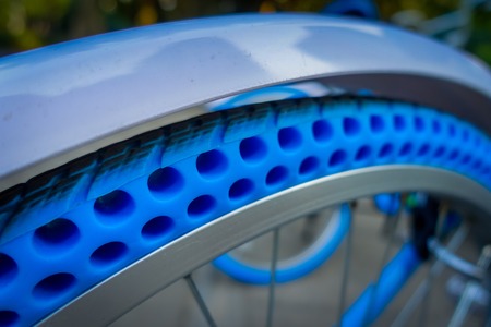 SHENZEN, CHINA - 29 JANUARY, 2017: Close up plastic wheel of inner city bicycle, modern bike tire technology for extra durabilityのeditorial素材